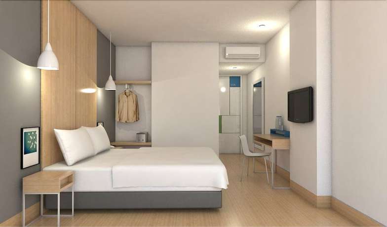 Imagen de la habitación del Hotel Citradream Cirebon. Foto 11