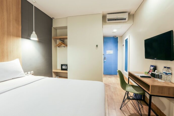 Imagen de la habitación del Hotel Citradream Semarang. Foto 21