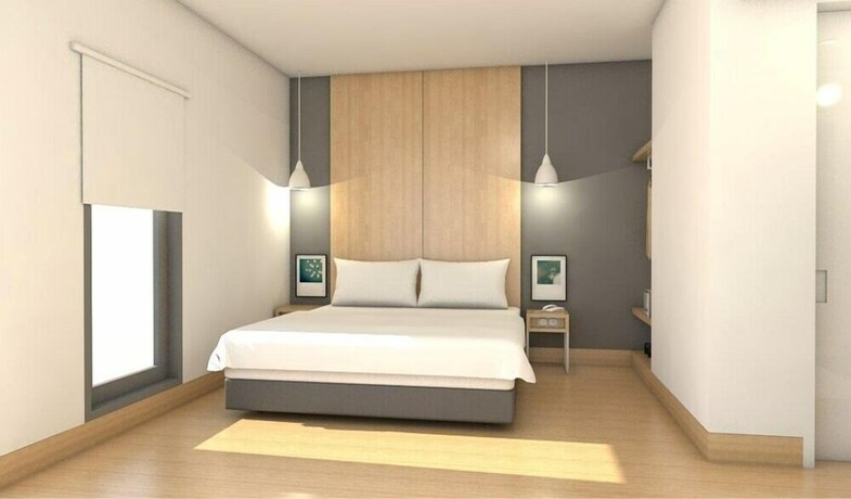 Imagen de la habitación del Hotel Citradream Semarang. Foto 30