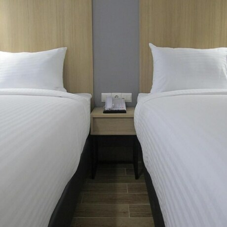 Imagen de la habitación del Hotel Citradream Semarang. Foto 32
