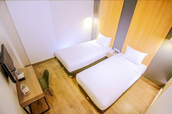 Imagen de la habitación del Hotel Citradream Semarang. Foto 33