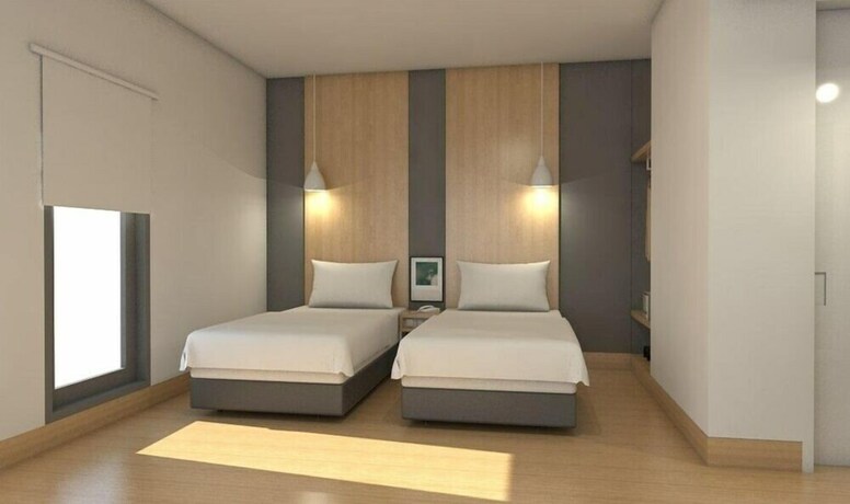 Imagen de la habitación del Hotel Citradream Semarang. Foto 34