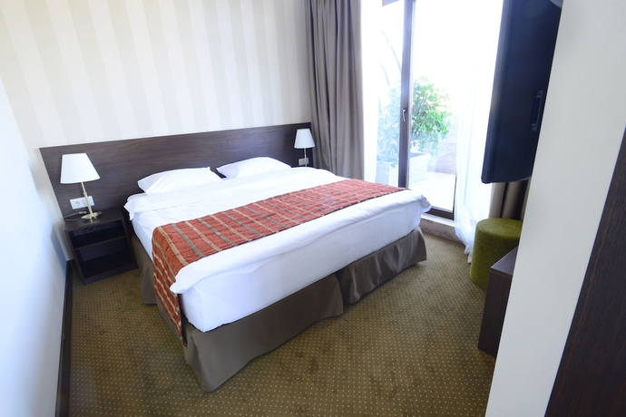 Imagen de la habitación del Hotel Citrus. Foto 6