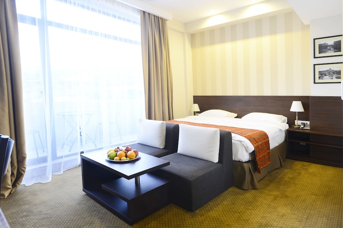 Imagen de la habitación del Hotel Citrus. Foto 16