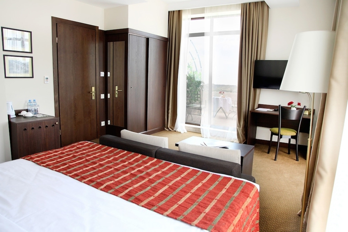 Imagen de la habitación del Hotel Citrus. Foto 18