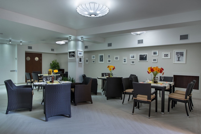 Imagen del bar/restaurante del Hotel Citrus Hotel. Foto 3