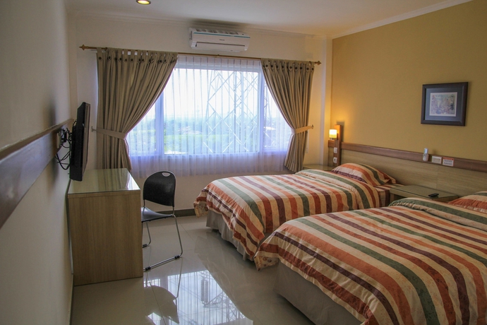 Imagen de la habitación del Hotel Citrus House. Foto 10