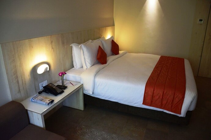 Imagen de la habitación del Hotel Citrus Prime, Candolim. Foto 16