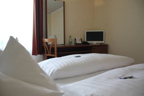 Imagen de la habitación del Hotel Citty Schweinfurt. Foto 6