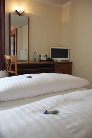 Imagen de la habitación del Hotel Citty Schweinfurt. Foto 7