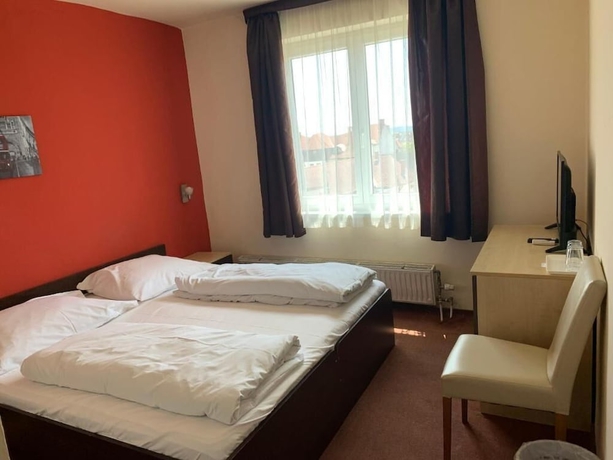 Imagen de la habitación del Hotel City Agoston. Foto 10