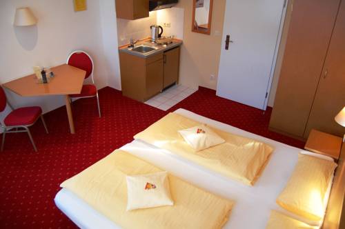 Imagen de la habitación del Hotel City Am Wasserturm. Foto 4