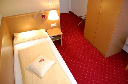 Imagen de la habitación del Hotel City Am Wasserturm. Foto 5