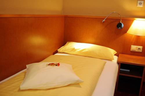 Imagen de la habitación del Hotel City Am Wasserturm. Foto 6