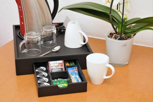 Imagen de la habitación del Hotel City Am Wasserturm. Foto 12