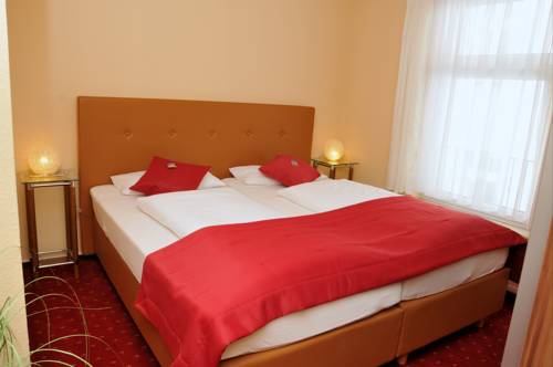 Imagen de la habitación del Hotel City Am Wasserturm. Foto 16