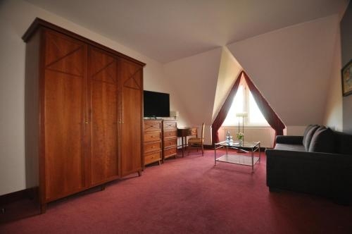 Imagen de la habitación del Hotel City Aschersleben. Foto 8