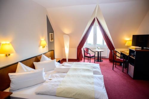 Imagen de la habitación del Hotel City Aschersleben. Foto 9