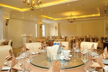 Imagen de la habitación del Hotel City Bay Palace. Foto 6