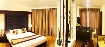 Imagen de la habitación del Hotel City Bay Palace. Foto 7