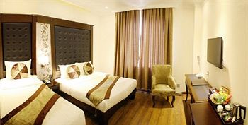 Imagen de la habitación del Hotel City Bay Palace. Foto 11