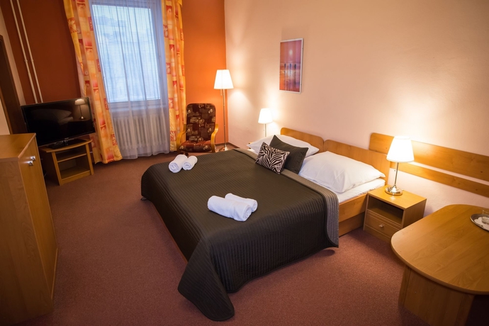 Imagen de la habitación del Hotel City Bell. Foto 3