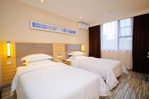 Imagen de la habitación del Hotel City Bianjie Maanshan Dangtu. Foto 9