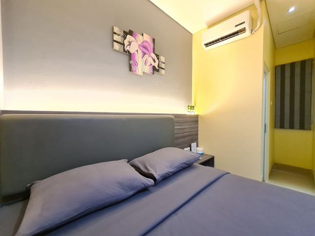 Imagen de la habitación del Hotel City Biz Residence. Foto 11