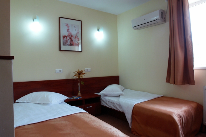 Imagen de la habitación del Hotel City Bucharest. Foto 8