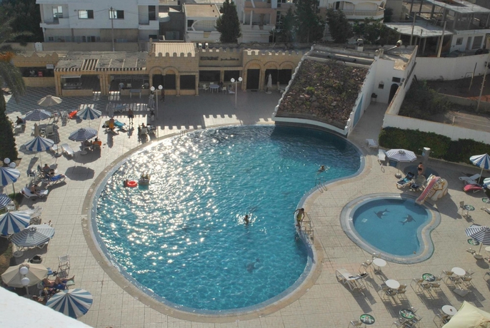 Imagen de la piscina del Hotel City Business Monastir Center. Foto 14