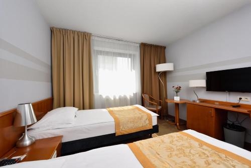 Imagen de la habitación del Hotel City, Bydgoszcz. Foto 8