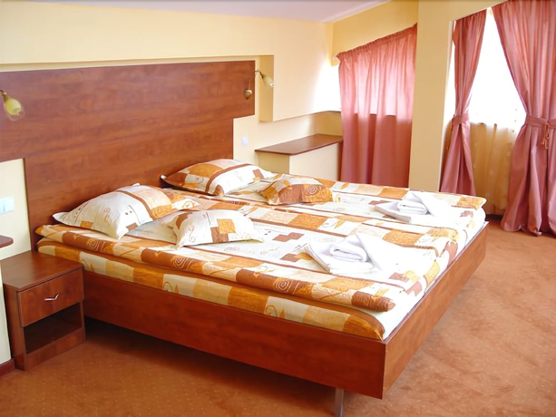 Imagen de la habitación del Hotel City Center Brasov. Foto 14