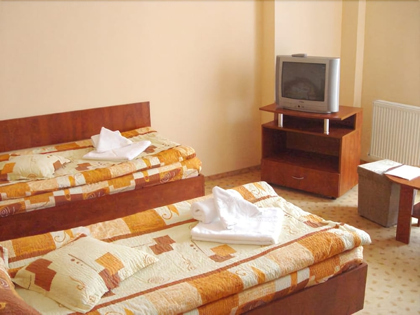 Imagen de la habitación del Hotel City Center Brasov. Foto 15