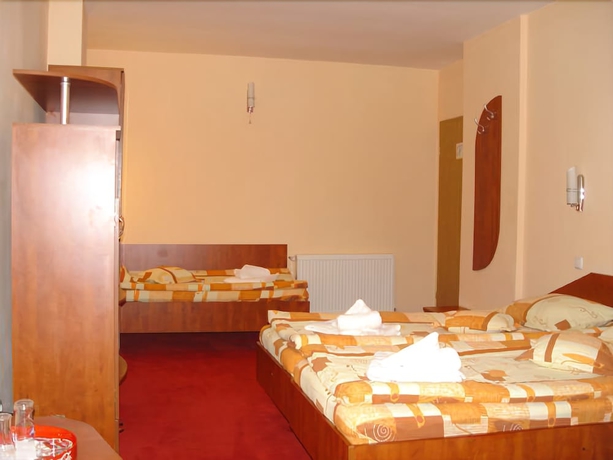 Imagen de la habitación del Hotel City Center Brasov. Foto 16