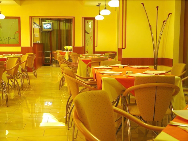 Imagen del bar/restaurante del Hotel City Center Brasov. Foto 7