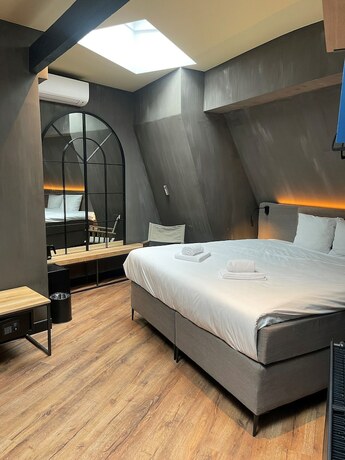 Imagen de la habitación del Hotel City Center Lodge Utrecht. Foto 20