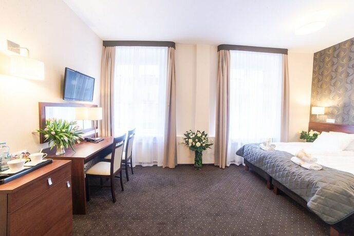 Imagen de la habitación del Hotel City Center Rooms, Lodz. Foto 26