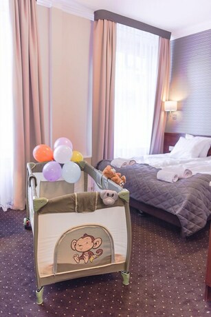 Imagen de la habitación del Hotel City Center Rooms, Lodz. Foto 27