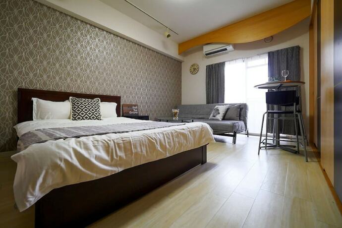 Imagen de la habitación del Hotel City Central Studio Apartments. Foto 21