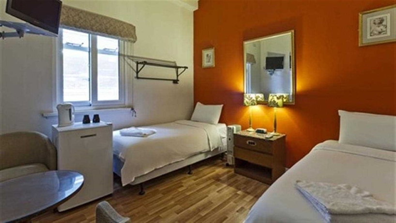 Imagen de la habitación del Hotel City Centre Budget. Foto 12