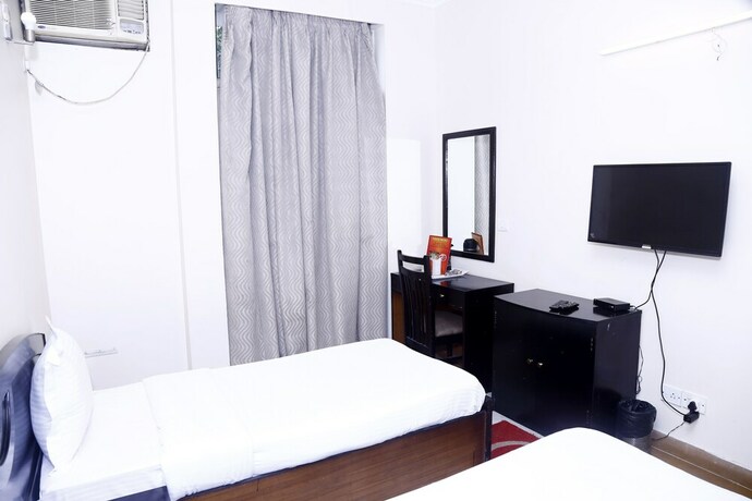 Imagen de la habitación del Hotel City Centre Inn New Delhi. Foto 17