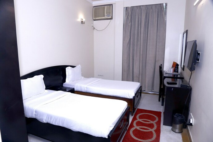 Imagen de la habitación del Hotel City Centre Inn New Delhi. Foto 27