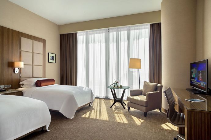 Imagen de la habitación del Hotel City Centre Rotana Doha. Foto 16