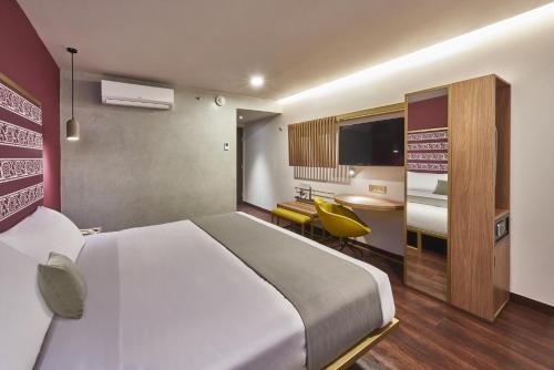 Imagen de la habitación del Hotel City Centro By Marriott Oaxaca. Foto 6