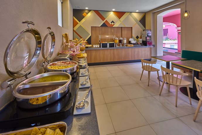 Imagen del bar/restaurante del Hotel City Centro By Marriott Oaxaca. Foto 3