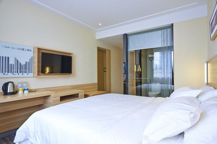 Imagen de la habitación del Hotel City Comfort. Foto 10