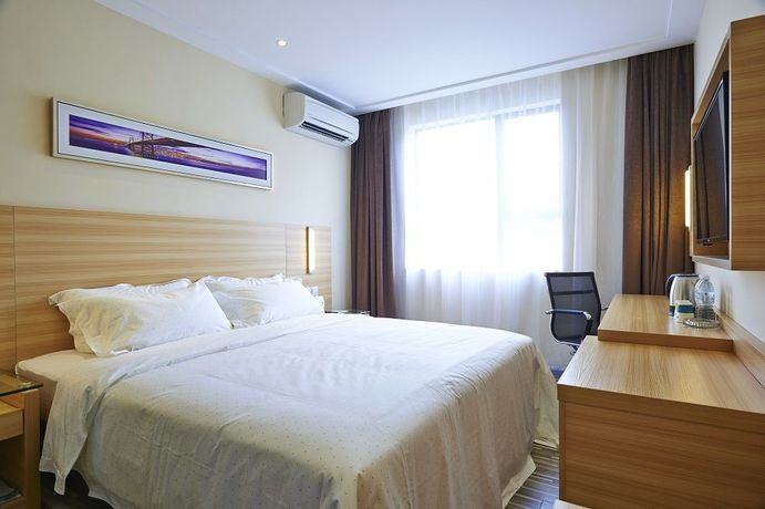 Imagen de la habitación del Hotel City Comfort. Foto 11