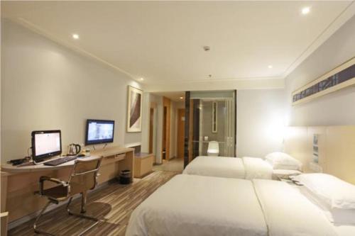 Imagen de la habitación del Hotel City Comfort Inn Foshan Jiaokou Bus. Foto 4