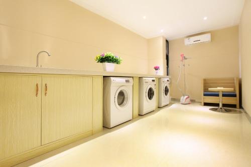 Imagen de la habitación del Hotel City Comfort Inn Foshan Jiaokou Bus. Foto 6