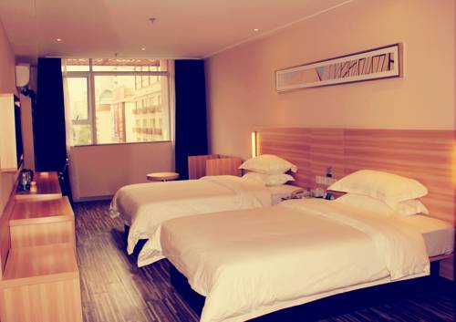 Imagen de la habitación del Hotel City Comfort Inn Guangzhou Tianpingjia Subway Stat. Foto 2